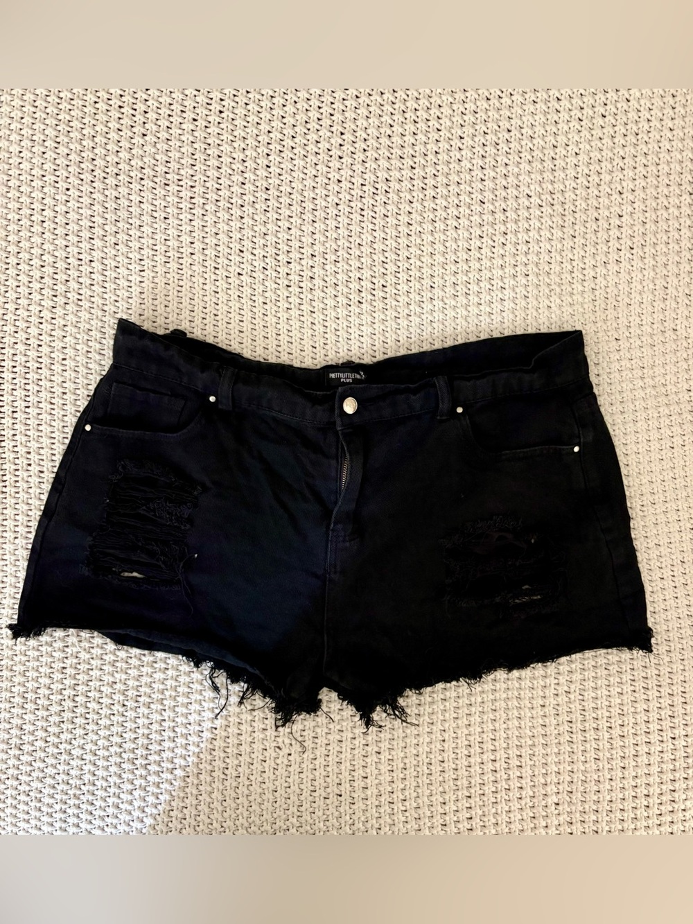 PrettyLittleThing Black Distressed Denim Cutoff Shorts
